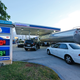 A truck fills up the empty tanks at a gasoline station in Hollywood, Florida. Image: AP